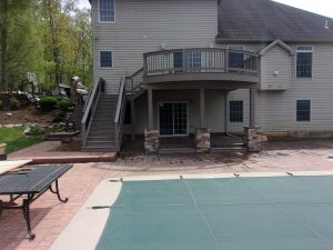 Timbertech PVC Weathered Teak deck with matching custom railings, curved front and covered posts &#038; beams &#8211; Harrisburg PA