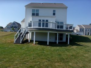 Timbertech PVC Castle Gate deck, steps and landing, curved front, posts &#038; beams covered with white vinyl &#8211; York PA