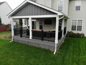 Timbertech PVC Castle Gate deck, A-frame roof with gable matching deck, black Timbertech radiance railings, &#8211; Newtown PA