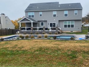 Timbertech PVC Castle Gate deck, A-frame roof and stone columns &#8211; Perkasie PA