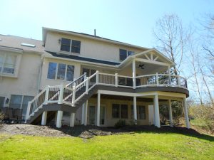 Timbertech PVC Castle Gate deck, curved front, covered posts &#038; beams, and A-frame roof with open gable &#8211; Media PA