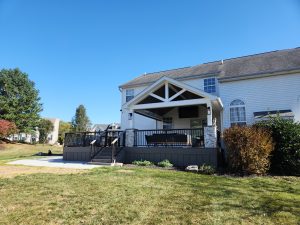 Timbertech PVC Coastline deck, A-frame roof with open 3 brace gable and stone columns, pre-finished wood ceiling and infrared heaters &#8211; Pottstown PA