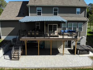 Timbertech PVC Brownstone deck with English Walnut border, black aluminum railings with horizontal stainless steel cable infill &#8211; Landenberg PA