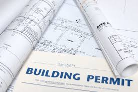 site plan, blueprints, and building permit for a construction build. 