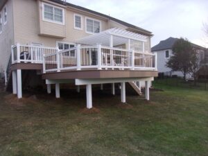 White Vinyl Pergola over Timbertech PVC Autumn Chestnut deck &#8211; Chester Springs PA